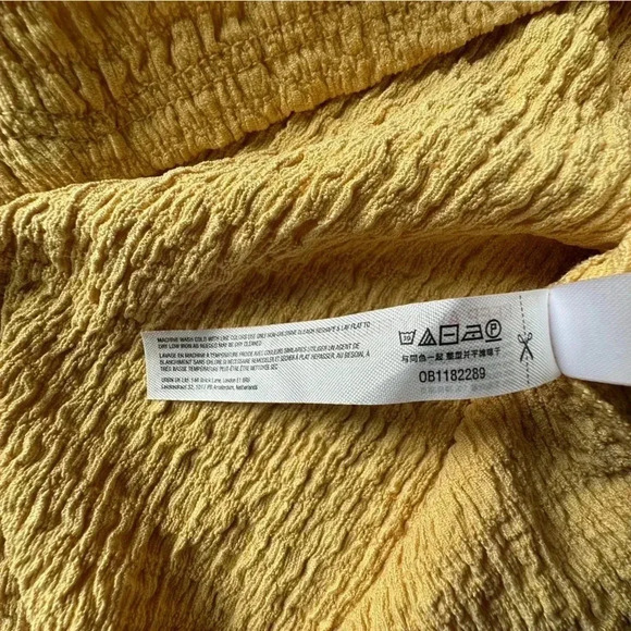 FREE PEOPLE BEACH NWOT ONE SHOULDER FLUTTER SLEEVE TEXTURED YELLOW TOP | MEDIUM - Picture 6 of 8